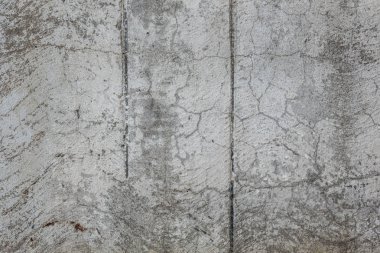 Çizikler ve çatlaklar ile duvar parçası. Arka plan olarak kullanılabilir