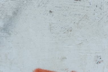 Çizikler ve çatlaklar ile duvar parçası. Arka plan olarak kullanılabilir