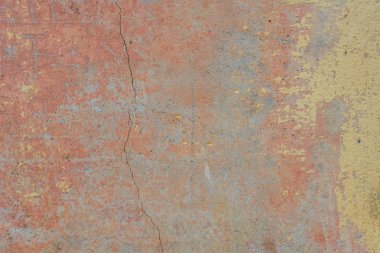 Çizikler ve çatlaklar ile duvar parçası. Arka plan olarak kullanılabilir