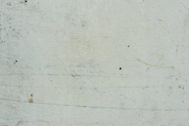 Çizikler ve çatlaklar ile duvar parçası. Arka plan olarak kullanılabilir