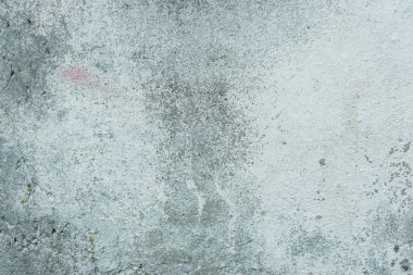 Çizikler ve çatlaklar ile duvar parçası. Arka plan olarak kullanılabilir