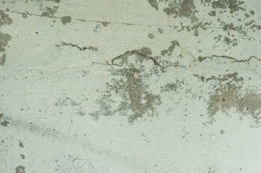 Çizikler ve çatlaklar ile duvar parçası. Arka plan olarak kullanılabilir