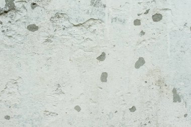 Çizikler ve çatlaklar ile duvar parçası. Arka plan olarak kullanılabilir