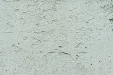 Çizikler ve çatlaklar ile duvar parçası. Arka plan olarak kullanılabilir