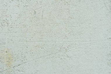 Çizikler ve çatlaklar ile duvar parçası. Arka plan olarak kullanılabilir