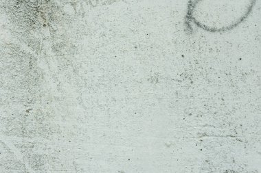 Çizikler ve çatlaklar ile duvar parçası. Arka plan olarak kullanılabilir