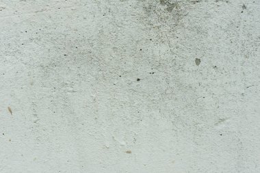 Çizikler ve çatlaklar ile duvar parçası. Arka plan olarak kullanılabilir