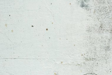 Çizikler ve çatlaklar ile duvar parçası. Arka plan olarak kullanılabilir