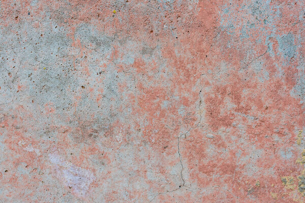 Фрагмент стены с царапинами и трещинами. Его можно использовать в качестве фона
