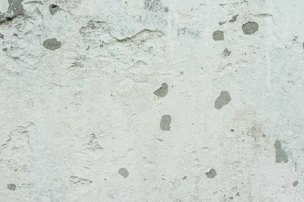 Çizikler ve çatlaklar ile duvar parçası. Arka plan olarak kullanılabilir