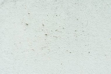 Çizikler ve çatlaklar ile duvar parçası. Arka plan olarak kullanılabilir