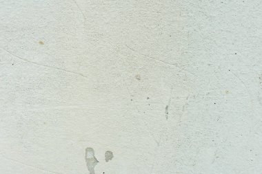 Çizikler ve çatlaklar ile duvar parçası. Arka plan olarak kullanılabilir