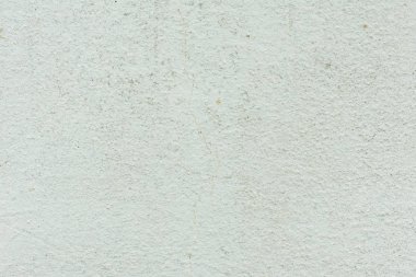 Çizikler ve çatlaklar ile duvar parçası. Arka plan olarak kullanılabilir