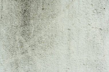 Çizikler ve çatlaklar ile duvar parçası. Arka plan olarak kullanılabilir