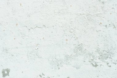 Çizikler ve çatlaklar ile duvar parçası. Arka plan olarak kullanılabilir