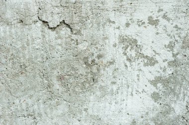 Çizikler ve çatlaklar ile duvar parçası. Arka plan olarak kullanılabilir