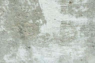 Çizikler ve çatlaklar ile duvar parçası. Arka plan olarak kullanılabilir
