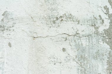 Çizikler ve çatlaklar ile duvar parçası. Arka plan olarak kullanılabilir