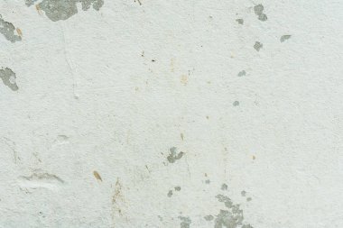 Çizikler ve çatlaklar ile duvar parçası. Arka plan olarak kullanılabilir