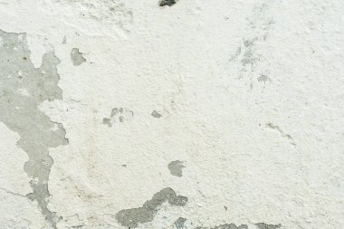 Çizikler ve çatlaklar ile duvar parçası. Arka plan olarak kullanılabilir