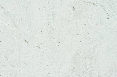 Çizikler ve çatlaklar ile duvar parçası. Arka plan olarak kullanılabilir