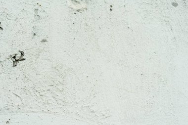 Çizikler ve çatlaklar ile duvar parçası. Arka plan olarak kullanılabilir