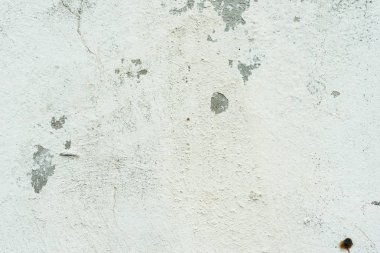 Çizikler ve çatlaklar ile duvar parçası. Arka plan olarak kullanılabilir