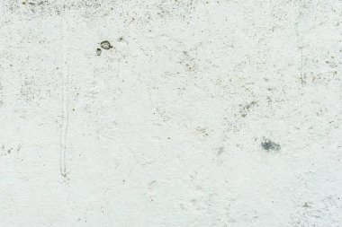 Çizikler ve çatlaklar ile duvar parçası. Arka plan olarak kullanılabilir