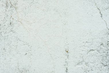 Çizikler ve çatlaklar ile duvar parçası. Arka plan olarak kullanılabilir