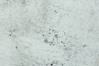 Çizikler ve çatlaklar ile duvar parçası. Arka plan olarak kullanılabilir