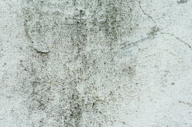 Çizikler ve çatlaklar ile duvar parçası. Arka plan olarak kullanılabilir