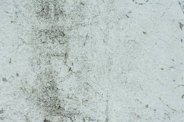 Çizikler ve çatlaklar ile duvar parçası. Arka plan olarak kullanılabilir