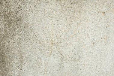 Çizikler ve çatlaklar ile duvar parçası. Arka plan olarak kullanılabilir