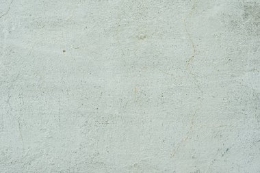 Çizikler ve çatlaklar ile duvar parçası. Arka plan olarak kullanılabilir