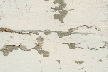 Çizikler ve çatlaklar ile duvar parçası. Arka plan olarak kullanılabilir