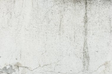 Çizikler ve çatlaklar ile duvar parçası. Arka plan olarak kullanılabilir