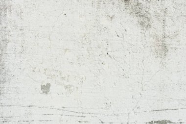 Çizikler ve çatlaklar ile duvar parçası. Arka plan olarak kullanılabilir