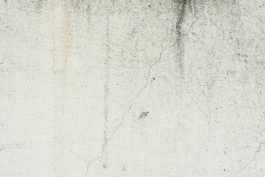 Çizikler ve çatlaklar ile duvar parçası. Arka plan olarak kullanılabilir