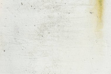 Çizikler ve çatlaklar ile duvar parçası. Arka plan olarak kullanılabilir