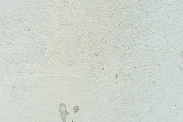 Çizikler ve çatlaklar ile duvar parçası. Arka plan olarak kullanılabilir