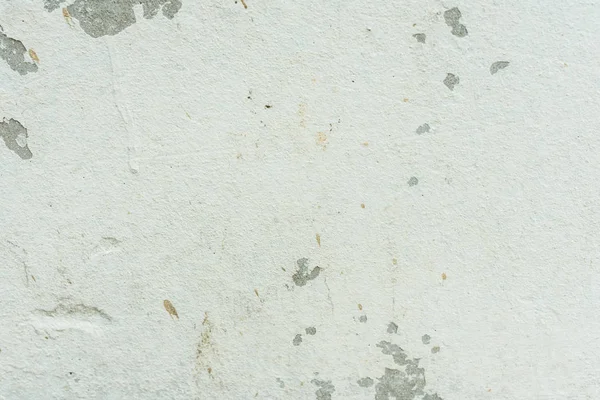 Çizikler ve çatlaklar ile duvar parçası. Arka plan olarak kullanılabilir