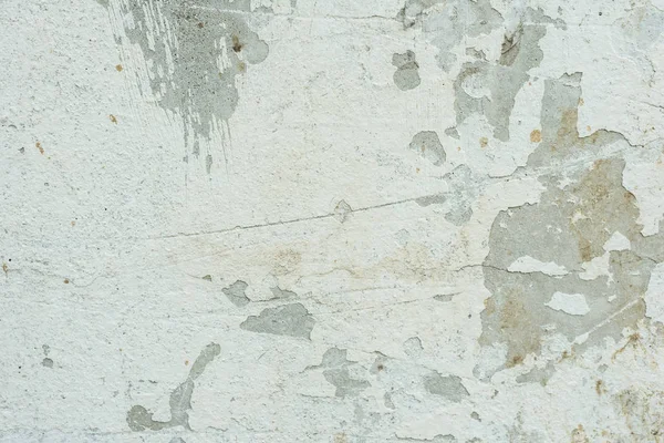 Çizikler ve çatlaklar ile duvar parçası. Arka plan olarak kullanılabilir