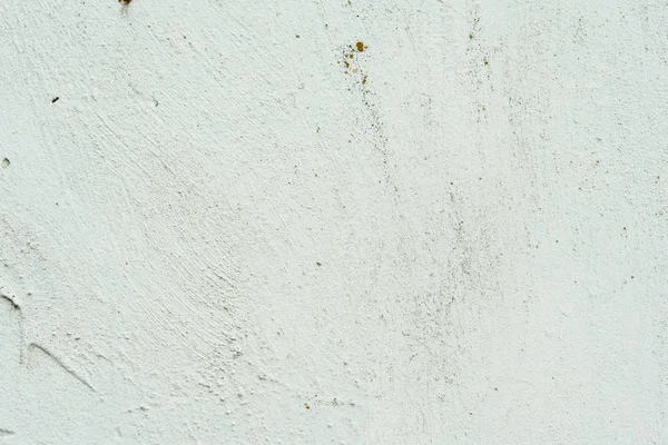 Çizikler ve çatlaklar ile duvar parçası. Arka plan olarak kullanılabilir