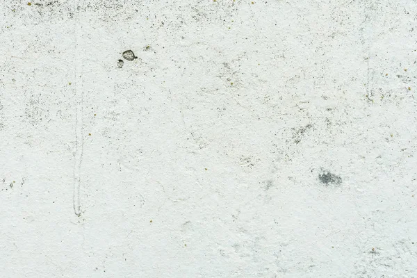 Çizikler ve çatlaklar ile duvar parçası. Arka plan olarak kullanılabilir