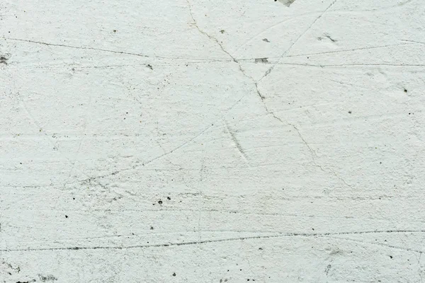 Çizikler ve çatlaklar ile duvar parçası. Arka plan olarak kullanılabilir