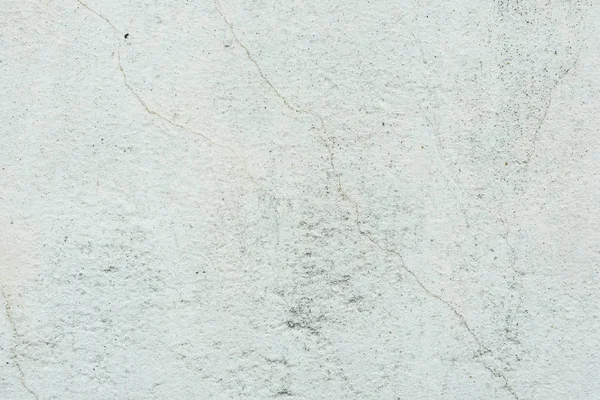 Çizikler ve çatlaklar ile duvar parçası. Arka plan olarak kullanılabilir