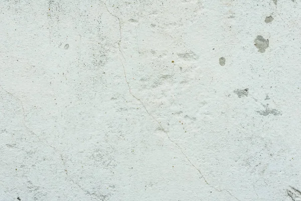 Çizikler ve çatlaklar ile duvar parçası. Arka plan olarak kullanılabilir