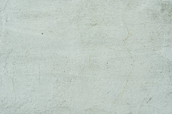 Çizikler ve çatlaklar ile duvar parçası. Arka plan olarak kullanılabilir