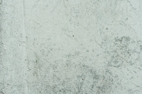 Çizikler ve çatlaklar ile duvar parçası. Arka plan olarak kullanılabilir