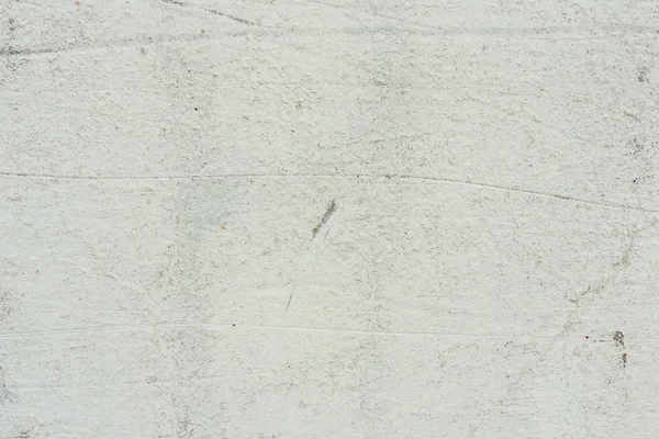 Çizikler ve çatlaklar ile duvar parçası. Arka plan olarak kullanılabilir